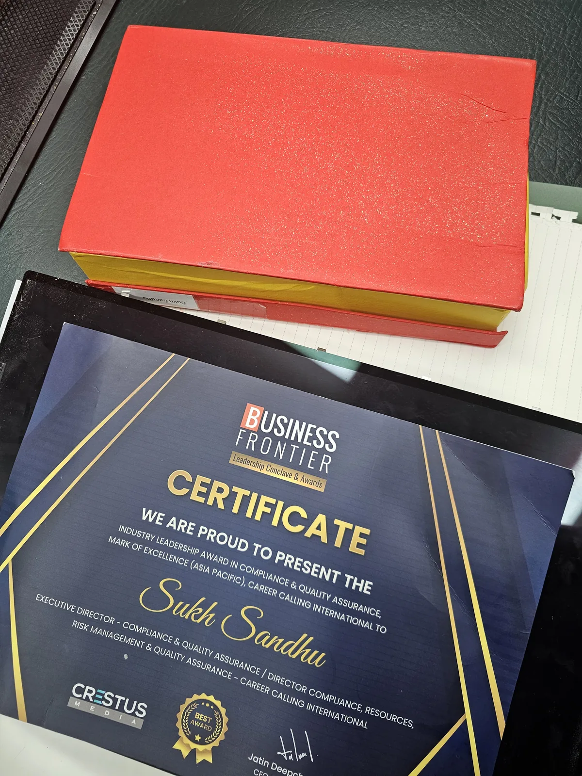 Business Frontier certificate presented to Sukh Sandhu
