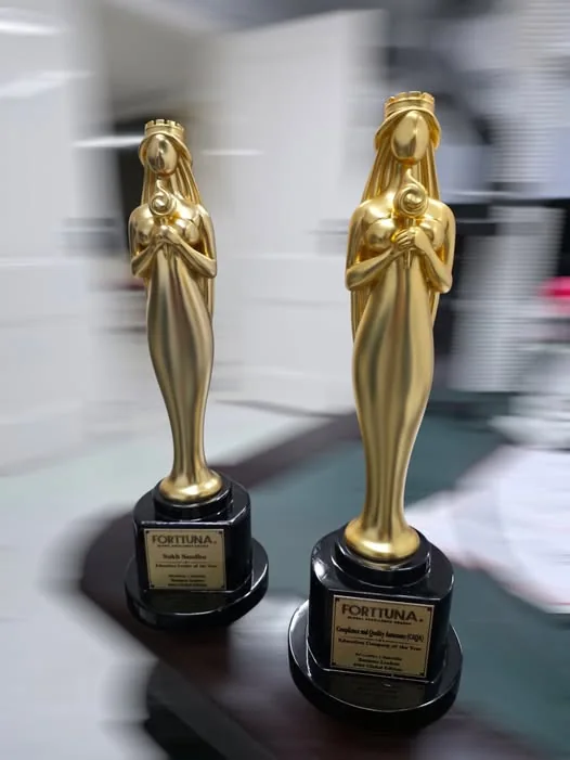Two Fortuna Global Excellence Awards recognize Sukh Sandhu's leadership in compliance and quality assurance.