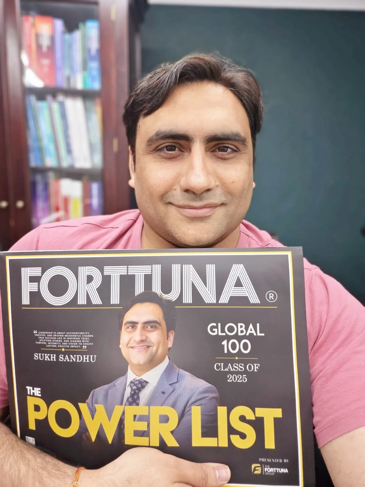Sukh Sandhu with the Fortuna Global 100 Power List magazine, recognizing leadership in governance risk management.