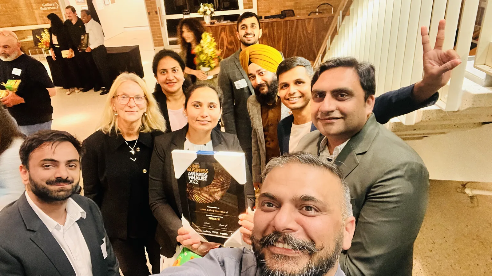 Sukh Sandhu logo with the Hume Business Awards certificate.