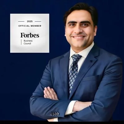 Sukh Sandhu Sukh Sandhu, a business professional and UN Representative, poses with a Forbes Business Council badge.