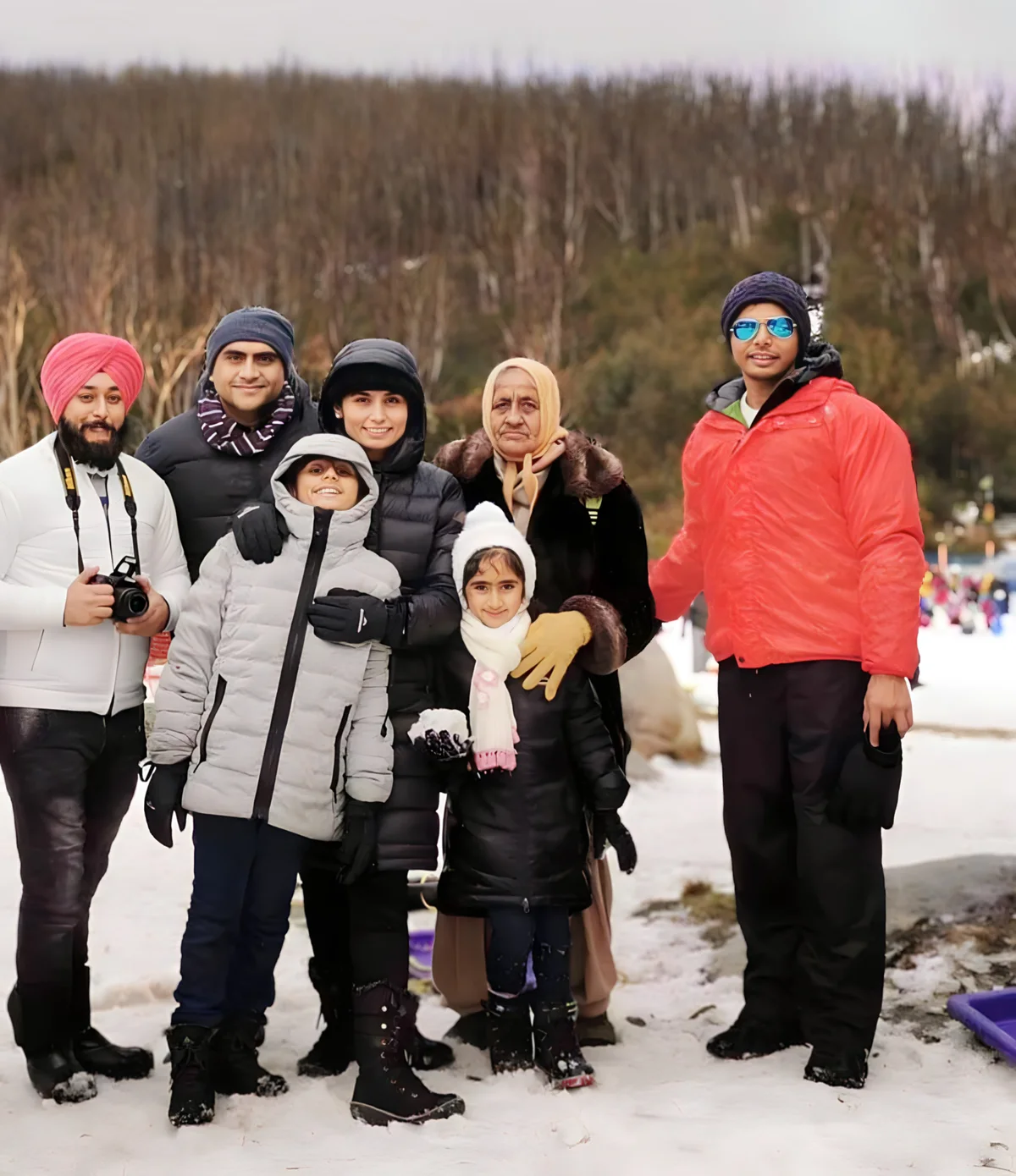 Sukh Sandhu with the team — photograph 15