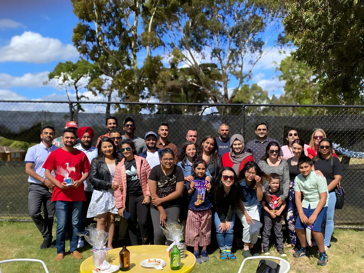 Sukh Sandhu with the team — photograph 16