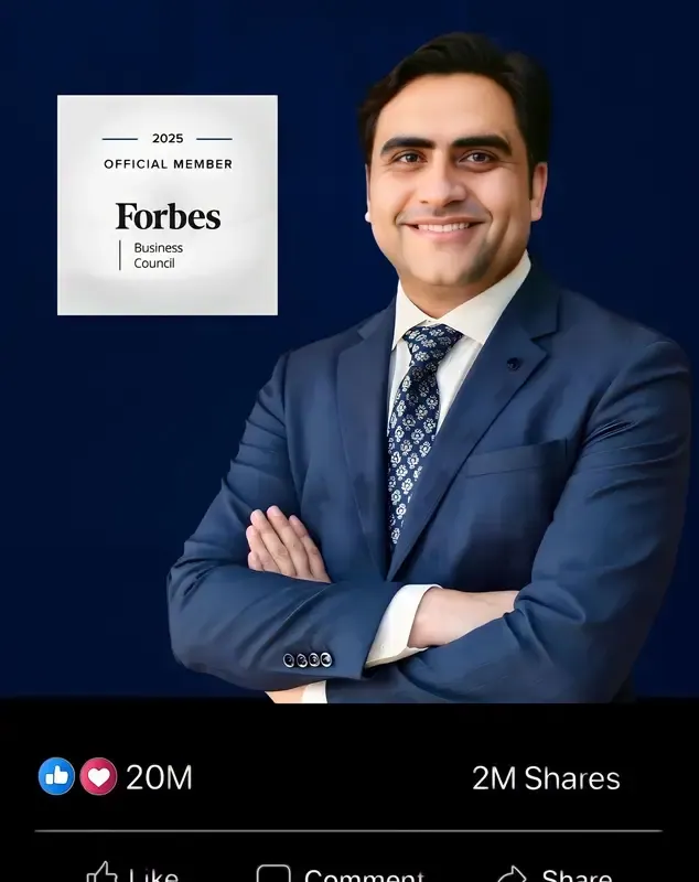 Sukh Sandhu poses with a Forbes Business Council official member badge, demonstrating professional development and.